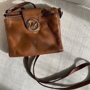 Brown Michael Kors crossbody, adjustable strap, built in wallet, gently used